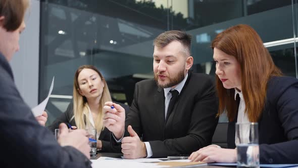 Business Meeting in Office Managers Discussing Project