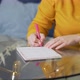 Woman is Writing Something on Sheets of Paper at Glass Table with Pen - VideoHive Item for Sale