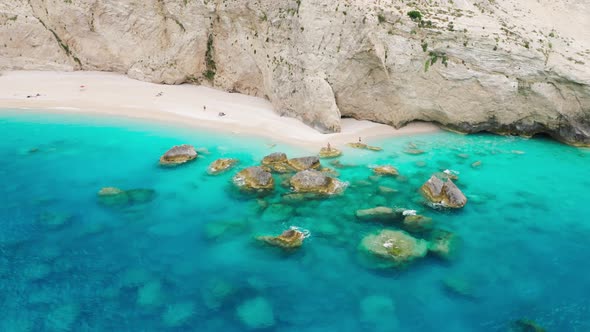 Aerial view coastline with tall cliff and turquoise sea water, Lefkada.