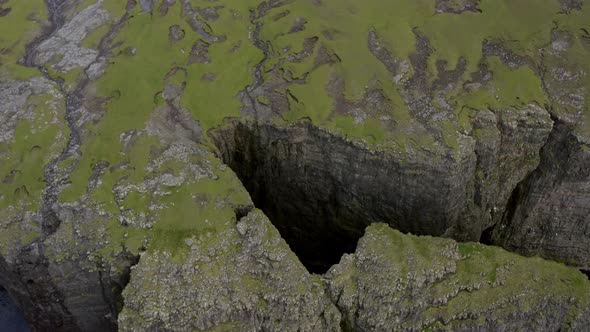 Drone Towards Cliffs And Coastline Of Suduroy