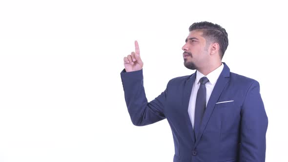 Stressed Bearded Persian Businessman Pointing Up and Giving Thumbs Down