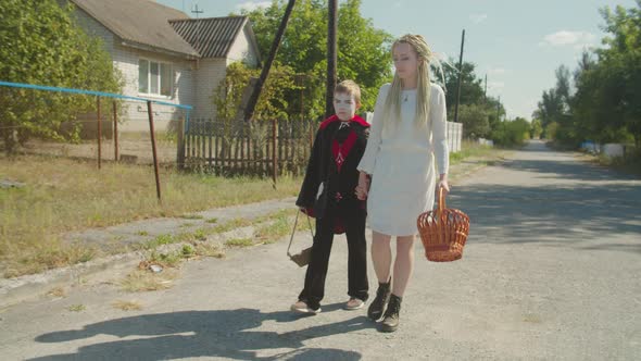 Sibling in Halloween Costumes Going for Treats