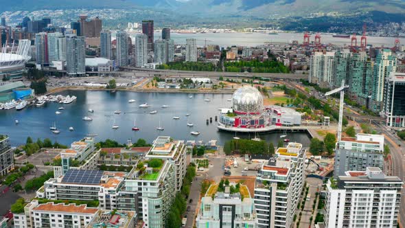 Panorama Of False Creek With Science World, BC Place And Downtown Vancouver In BC, Canada. - aerial