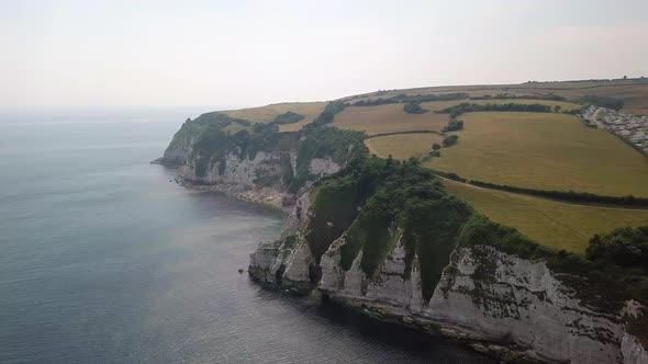 Aerial view from the Beach Beer in Devon, England. Coastal town with sandy beach, a typical tourist