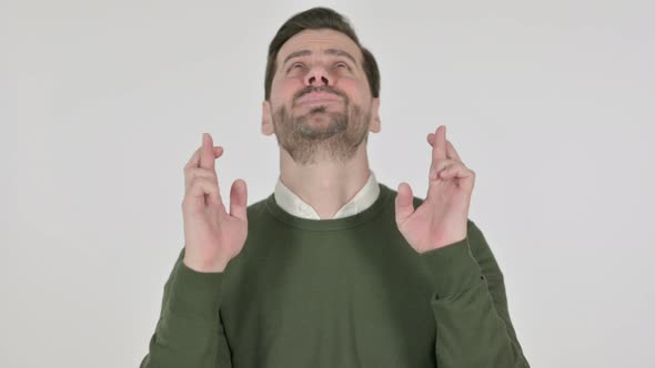 Portrait of Man Praying with Fingers Crossed White Screen