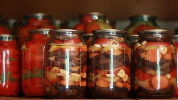 Jars With Pickled Vegetables On Wooden Shelf