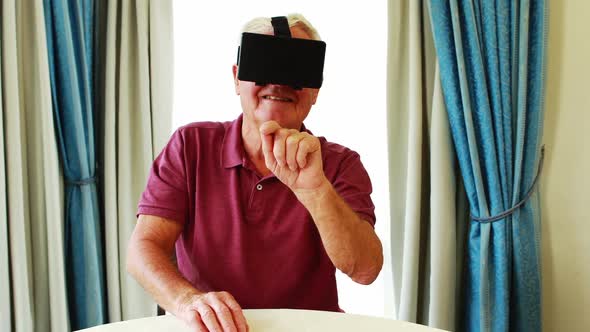 Portrait of retired man wearing virtual glasses