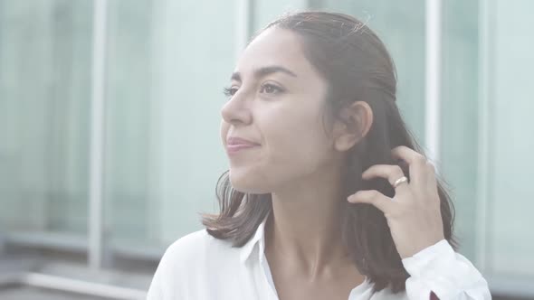 Happy Female Office Worker Chatting with Colleague