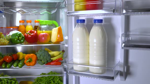 Open Refrigerator Filled with Food