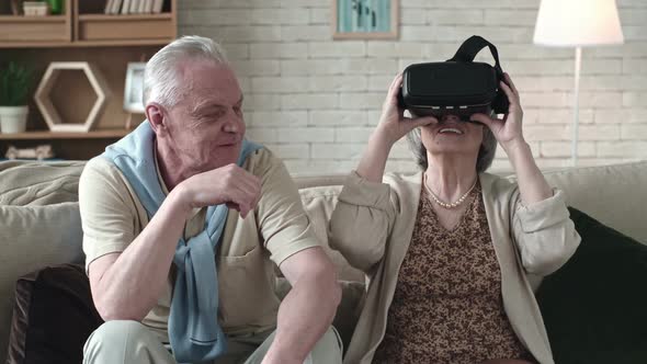 Elderly Woman Trying Virtual Reality Glasses