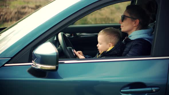 Happy Family Mother And Child Boy Leisure. Son Boy Vacation Happiness. Cute Little Kid Having Fun.