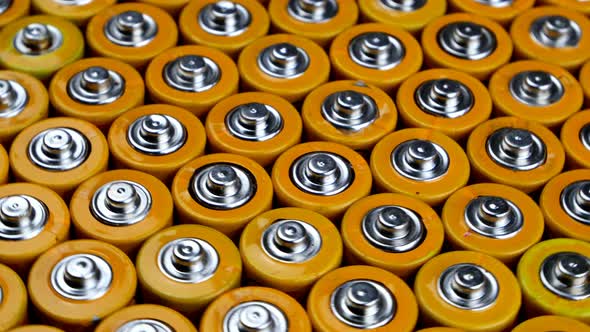 Many Used AA Alkaline Batteries Finger Batteries in Heap Ready for Recycling