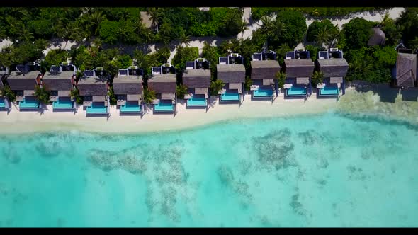 Aerial panorama of paradise coast beach break by shallow lagoon with white sand background of advent