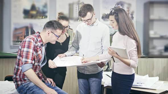 Group of Young Businesspeople in a Modern Office