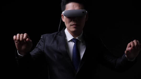 Business man wearing VR glasses.