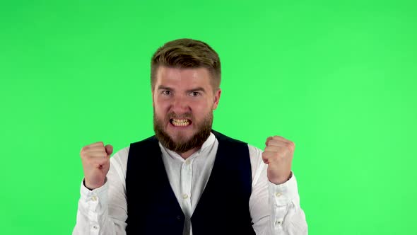 Angry Man Is Very Screaming. Green Screen