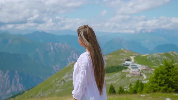 Moving Around Girl on the High Mountains of the Alps