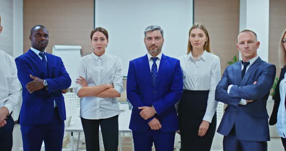 Team of Motivated Businessmen in Business Suits