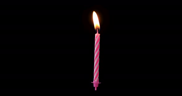 Realistic full-sized single pink birthday candlelight isolated on black background.