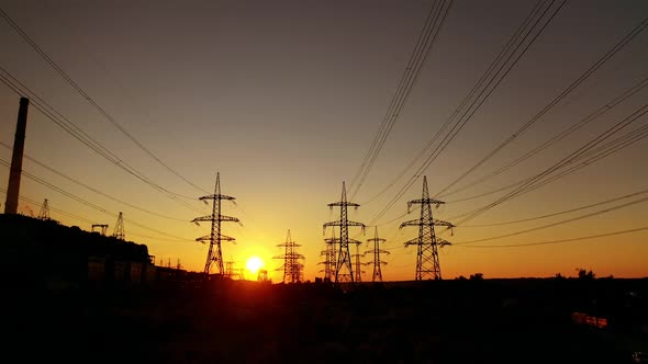 High voltage post. Aerial view of power lines in natural landscape