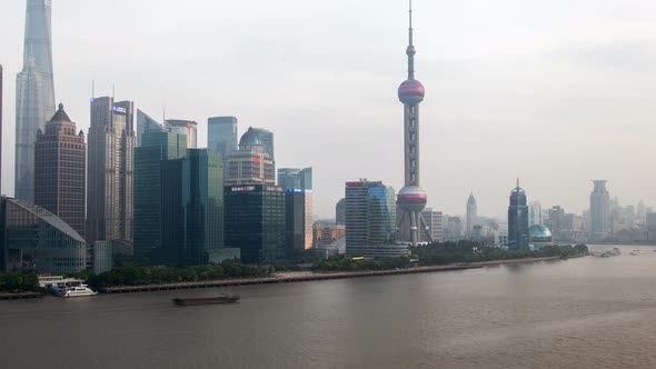 Shanghai River Urban Cityscape Aerial Skyline Panorama Timelapse at Day Zoom Out