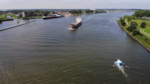 big cargo vessel sailing on a dutch river