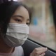 Asian Girl In Car Wearing A Medical Mask During Pandemic Of Coronavirus Covid-19 - VideoHive Item for Sale