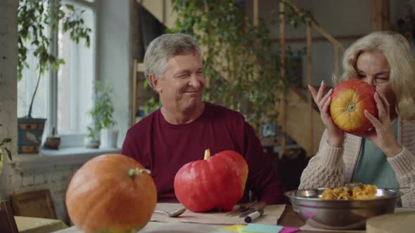 The Family Prepares a Pumpkin for Halloween Together