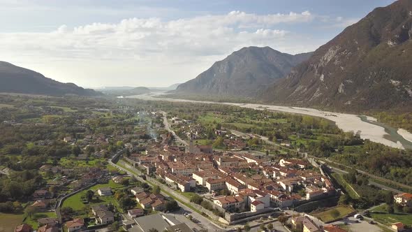 Aerial View of a Small Historic Town Venzone in Northern Italy with Red Tiled Roofs of Old Buildings