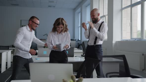 Bearded Men Clap Their Hands to the Beautiful Lady in White Shirt