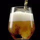 Beer pour into glass on rotating display turntable - VideoHive Item for Sale