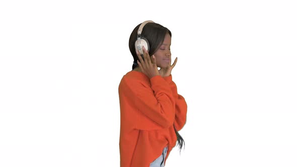 Happy African Woman Wear Wireless Headphones Listening Music on White Background.