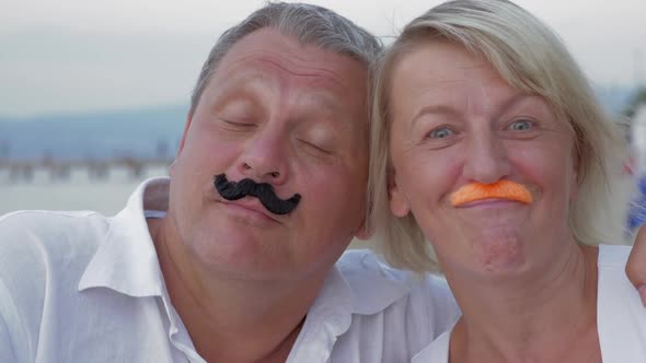 Funny Senior Couple with Moustache