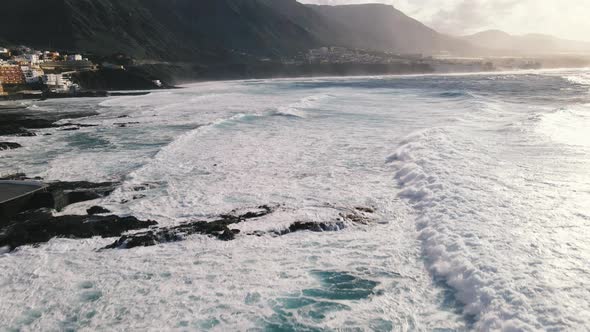 Aerial Drone View of Ocean Waves Splash Around Tenerife Canary Islands Spain