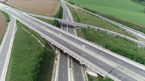 Aerial view of highway and overpass. Road junction, highway intersection top view. Road traffic