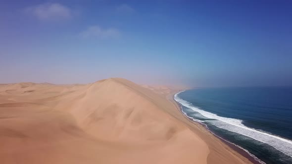 Sandwich Harbour in Namibia at the Coast of the Atlantic Ocean