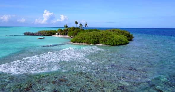 Natural overhead clean view of a sandy white paradise beach and blue ocean background