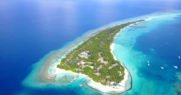 Tropical aerial abstract view of a paradise sunny white sand beach and blue sea background in vibran