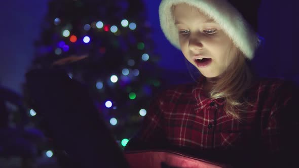 Child Opens a Glowing Gift