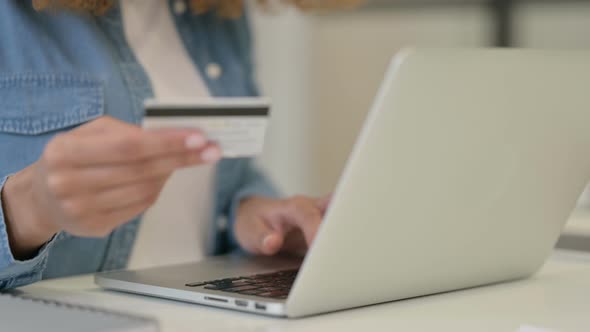 Close Up of African Woman Doing Online Shopping Payment with Credit Card