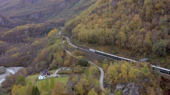 The Flam to Myrdal Train Passing Through Beautiful Landscapes