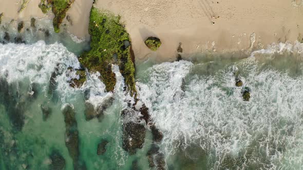 Top Down Drone View at Ocean Shore Bali Indonesia