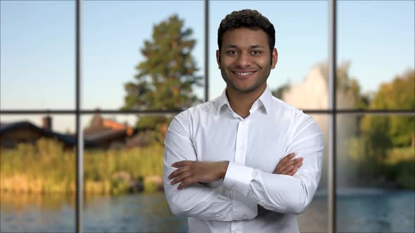 Handsome Businessman Giving Thumb Up To Camera