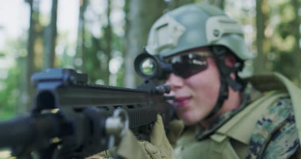 Soliders Aiming Assault Rifle and Protecting Military Base