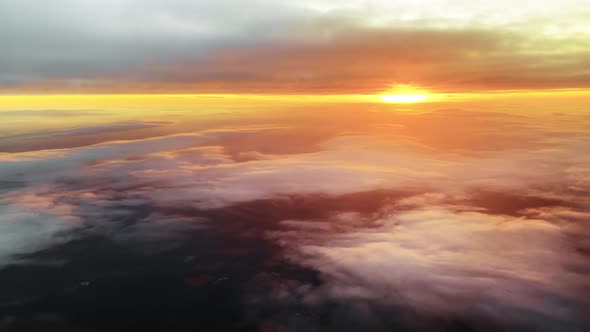 Stunning Sunset Over Floating Clouds