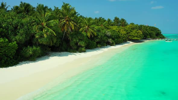 Aerial drone shot nature of luxury shore beach holiday by blue ocean with white sand background of a