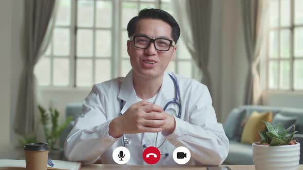 Male Doctor Video Call And Consult Client Online