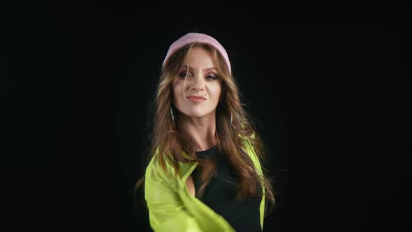 Portrait of Hipster Lady Dancing Isolated on Black Studio