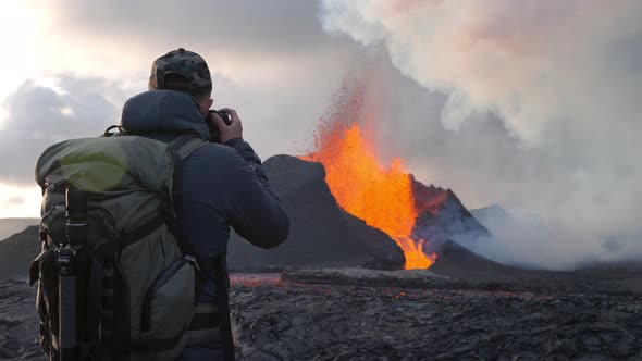 Photographer Shooting Erupting Fagradalsfjall Volcano In Reykjanes Peninsula