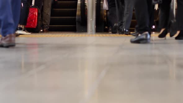 Low Angle Japanese Commuters Walking